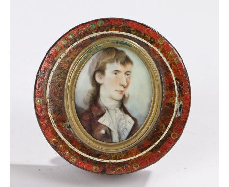 Regency papier mache and miniature snuff box, the portrait miniature of a gentleman with long head housed behind glass and se