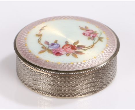 Swiss silver and enamel box and cover, of cylindrical form, the puce and white enamel lid with foliate decoration, stamped "F