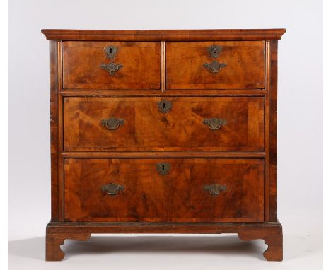 18th Century walnut chest of drawers, the crossbanded rectangular top above two short and two long drawers on bracket feet, 8