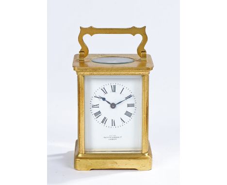 Gilt brass carriage clock, retailed by Mappin &amp; Webb, with a white enamel dial with black Roman hours, lever platform esc