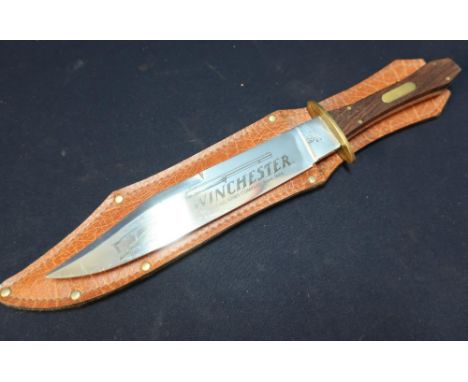 Winchester advertising Bowie type knife with 8 1/2 inch blade stamped with skull and bones, and engraved 'Winchester model 18