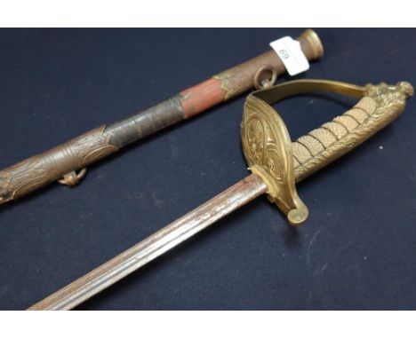 19th C Naval Officers Dress Sword with 31 1/2inch double part fullered blade, crowned anchor Naval Crest and lion head pommel