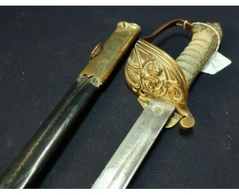 George V British Royal Navy Volunteers Officers Sword with 31 inch straight single fullered blade with engraved detail includ