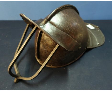 17th C English Civil War period lobster tail helmet with raised comb and peaked three bar visor 