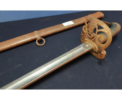 Victorian Light Infantry Officers Sword with 32 1/2 inch slightly curved broad single fullered blade, with engraved detail in