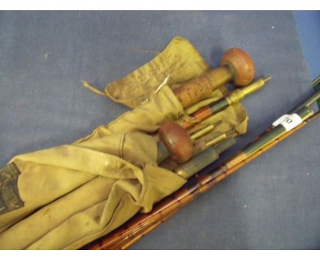 Collection of three vintage split cane salmon rods including steel centered No 9053 three piece cane with spare end section a