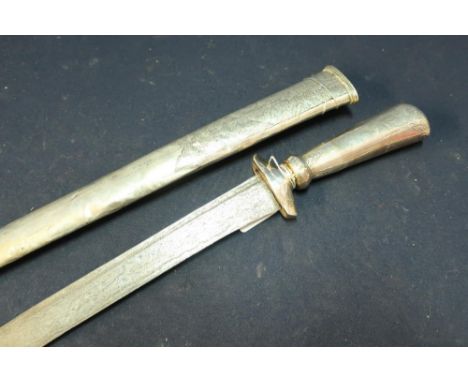 19th C white metal Malaysian Kris style sword with 19 3/4 inch tapering blade, with an Eastern white metal grip and bound sca