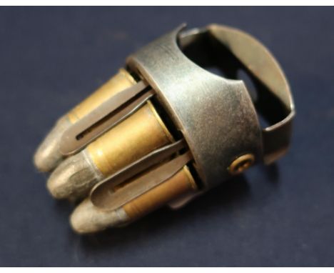 Scarce paradox loader with broad arrow and 1919 stamps P-L2, with 6 inert .45 bullets 