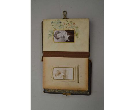 Small Victorian album containing various miniature portrait photographs
