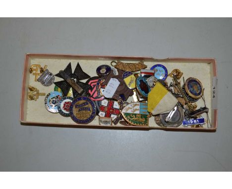 Box of various vintage pin badges