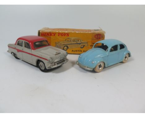 Dinky 176 Austin 105 Saloon in grey with red stripe and roof, boxed _ Slight paint loss, box poor AND Dinky 181 Volkswagen Sa