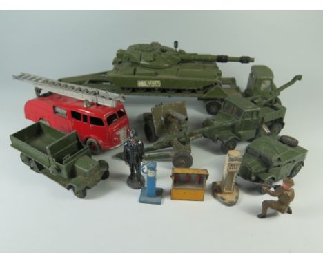 A Selection of EIGHT Dinky. Military vehicles, fire engine and figures _all play worn