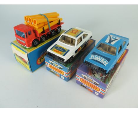 Matchbox MB 9f Ford Escort, blue 'PHANTOM', boxed AND 9f 'Shell' and 'Dunlop', boxed AND 10d Leyland Pipe Truck, boxed _ all 