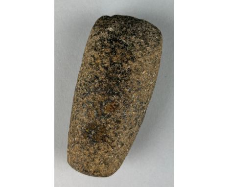 A POLISHED NEOLITHIC STONE AXE HEAD FROM YORKSHIRE, Ex Victorian collection, finely shaped and polished. Found on the bank of