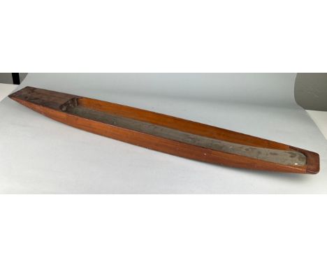 A 19TH CENTURY APPRENTICE MODEL OF A BOAT 