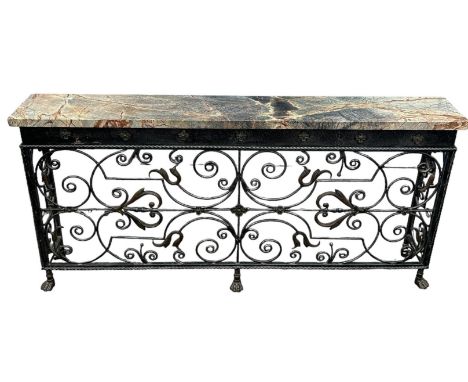 A LARGE WROUGHT IRON CONSOLE TABLE WITH VARIEGATED MARBLE TOP RAISED UPON SIX LION PAW FEET, 175cm x 85cm x 28cm