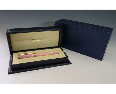 A Chopard gold-plated and rose enamel ballpoint pen, with box