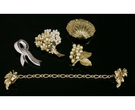 A Trifari gold-plated spray brooch,set with simulated pearls and paste,together with a Trifari gold-plated leaf brooch,with a