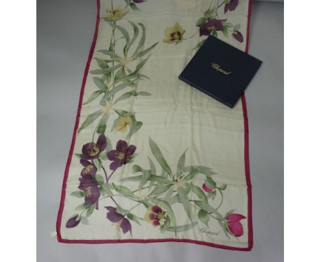 A Chopard silk scarf,cream ground with pink border and hellebore floral pattern, in box