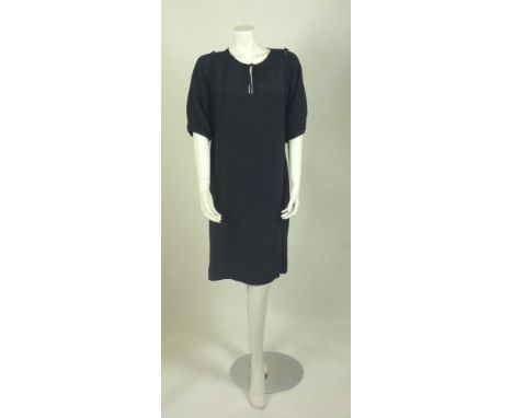 A Jaeger London navy silk dress,with tie to neckline and button detail to arms, a Jaeger London cream silk dress,with tie to 