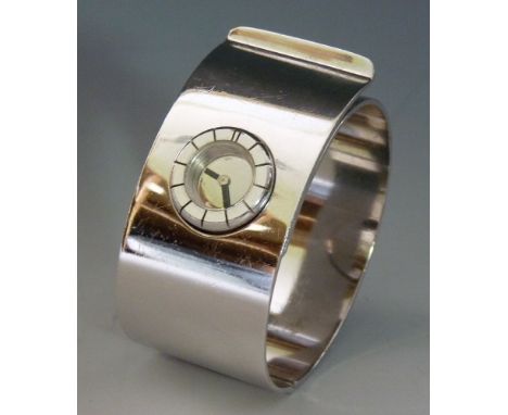 A ladies' cuff-style rhodium-plated Lanvin mechanical bangle watch,with a circular silver dial and black hands, a raised flat