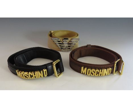 A Moschino belt,black canvas with gold tone Moschino lettering, a Moschino belt, brown canvas with gold tone Moschino letteri