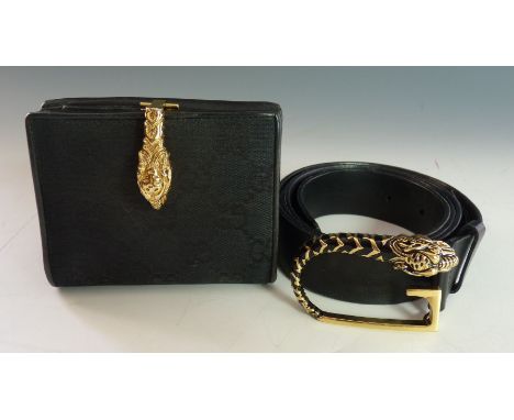 A Gucci double 'G' monogrammed canvas wallet, with gold tone tiger's head clasp, anda Gucci black leather belt, with a black 
