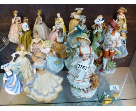 Shelf of ceramic lady figures