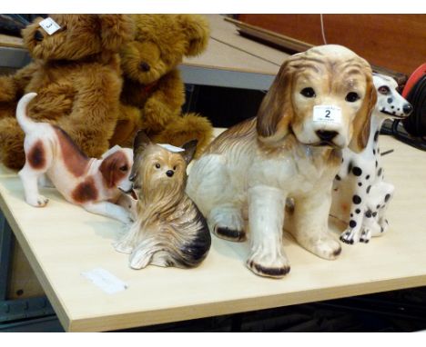 Four cast ceramic dog figures