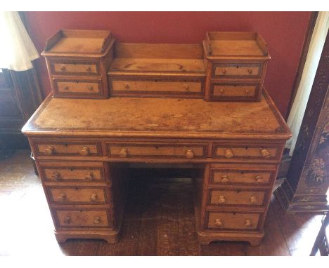 A Victorian oak and pollard inlay pedestal writing desk, circa 1870, a two higher section with an oak gallery above two short