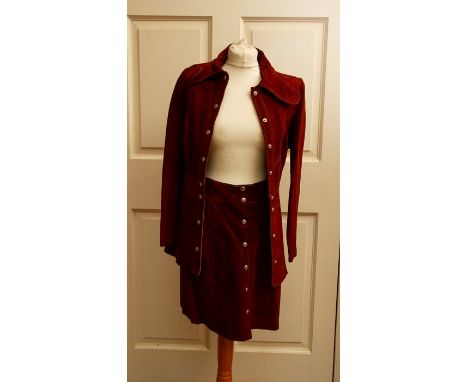 A 1960's Suede jacket &amp; mini skirt in burgundy with stud metal popper fastening.&nbsp; Together with a repoduction pale p