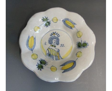 A Dutch Delft scalloped dish with a portrait of King William, circa 1690, 21.5cm diameter, 6cm highCondition: chips to unders