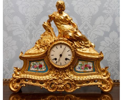 A late 19th Century French gilt ormolu bracket clock, circa 1870, of Rococo Revival design, surmounted with a classically dra