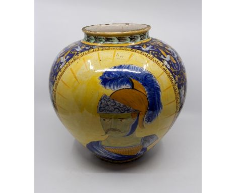 An Italian maiolica pottery portrait vase, Deruta type, 19th Century, ovoid, each side with a saint portrait, divided by grot