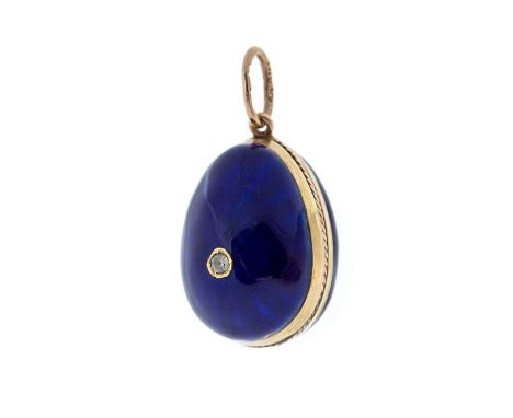 A Faberge gold and enamel enamel egg shaped pendant, early 20th Century, deep blue guilloche enamel set with a single old cut