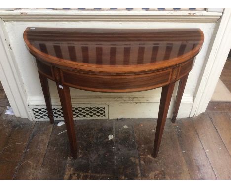 George III mahogany demilune food over card table, satinwood cross banded edge, raised on square tapered legs, green baize to