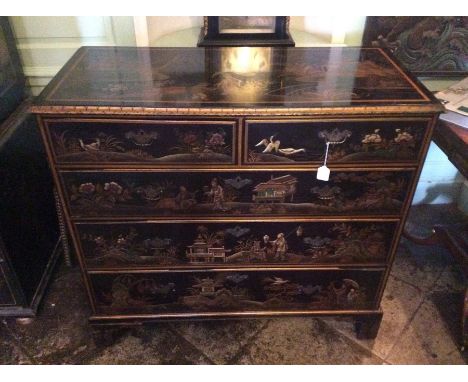 A George III Japanese Chinoiserie chest of drawers, circa 1800, decoration of an ancient Japanese village above two short and