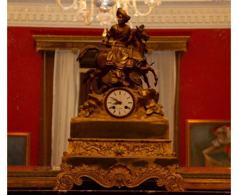 A 19th Century French ormolu bracket clock ,circa 1870, surmounted by an Arab with a sabre on horseback 8cm white enamel Roma