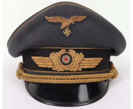 Third Reich Luftwaffe Generals Peaked Cap, mid war produced example in standard Luftwaffe officer quality production. Blue gr