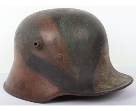 Imperial German Camouflaged M-17 Steel Combat Helmet, good untouched example with a green, brown and black camouflage scheme 