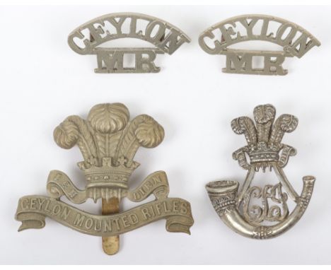 Ceylon Light Infantry Headdress Badge, fine white metal example with prince of Wales plumes above strung bugle and “CLI” to c