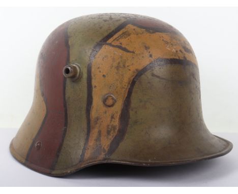 Imperial German M-16 Camouflaged Steel Combat Helmet, super example of a standard pattern M-16 steel combat helmet which has 