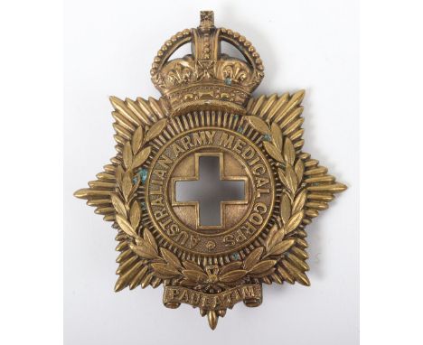 Australian Army Medical Corps Headdress Plate, brass other ranks kings crown example with voided central cross. Two lug fitti
