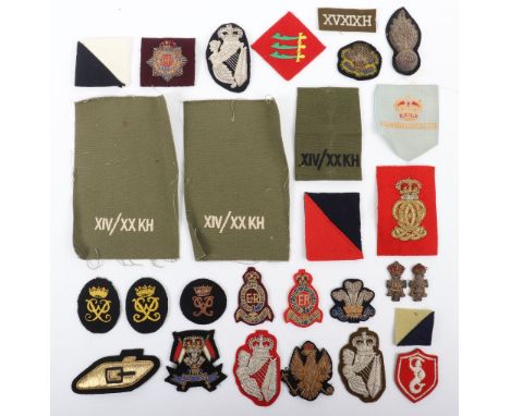 Selection of British Cavalry Cloth Badges and Insignia, consisting of bullion embroidered sleeve badges and beret badges, for