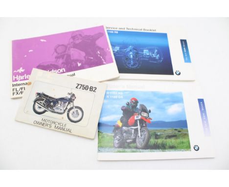 A collection of motorcycle owner's manuals and service books for BMW R1100RS, a Kawasaki Z750-B2 and a Harley Davidson FL/FLH