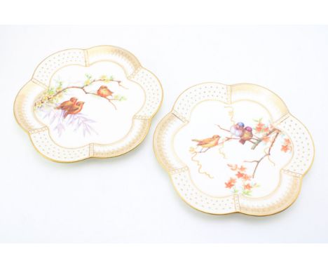 A pair of Victorian Brownfield shaped cabinets plates of birds amongst foliage, 23.5cm diameter (2).  In good condition with 