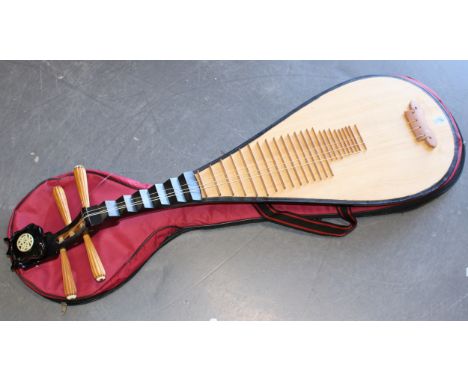 Chinese guitar / lute in carry case, 100cm tall.  One string is snapped.