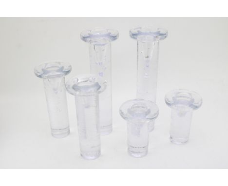 A collection 'Kosta Boda' glass candle sticks, 30cm tall, (6).  Of first quality with no obvious signs of damage or restorati