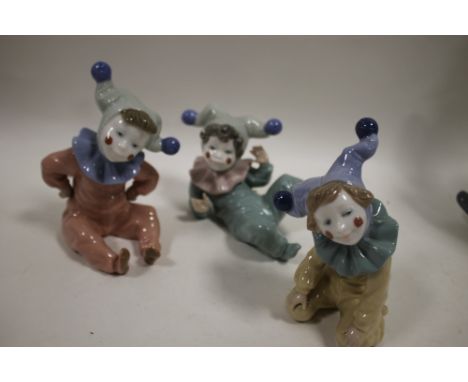 THREE NAO CHILD CLOWN FIGURES