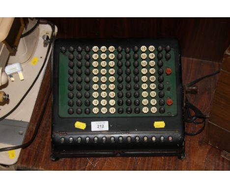 A VINTAGE BURROUGHS COMPTOMETER MACHINE